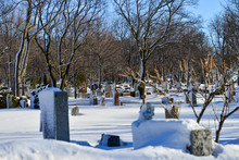 Old Cemetery With Snow Covered Tomb Stones On Beautiful Sunny Day, Mount Royal Cemetery  