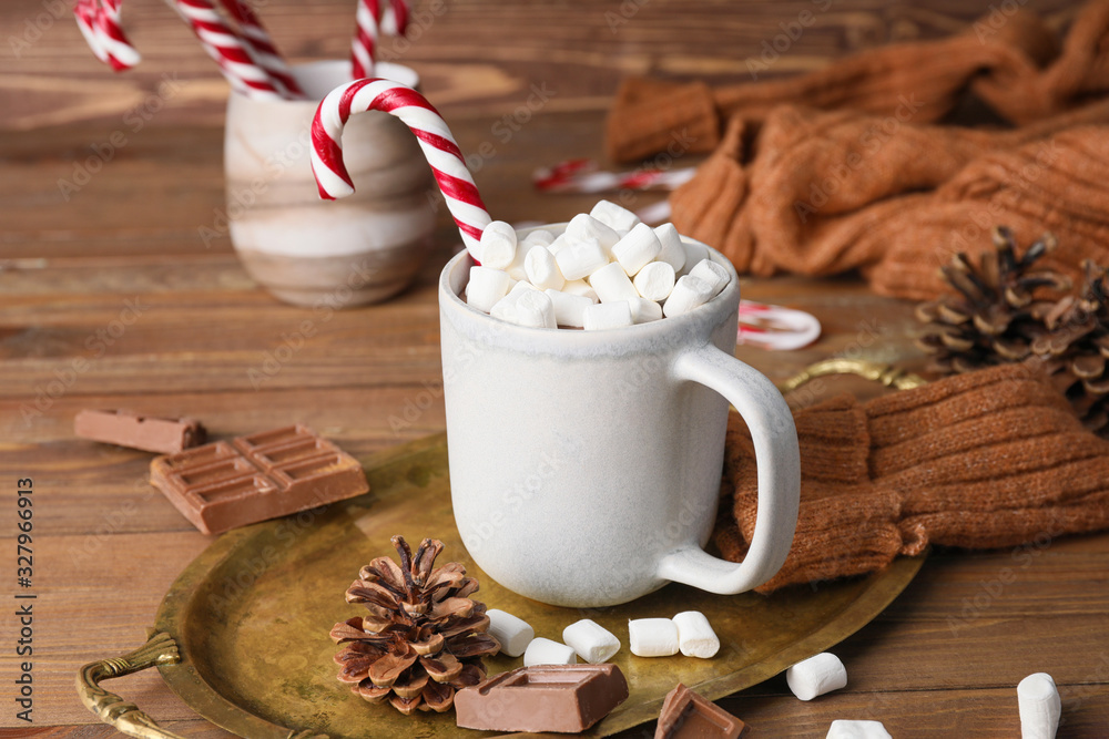 Cup of hot chocolate on wooden table