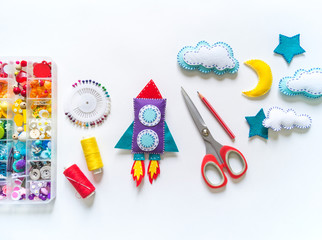 Wall Mural - Rocket craft space toy. Made from felt.