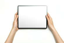 Woman Hand Hold A Tablet Isolated On White.