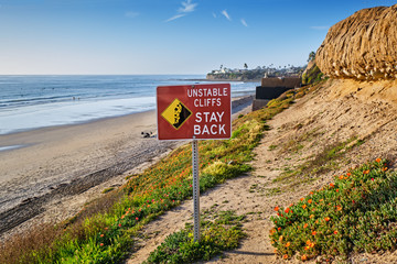 Wall Mural - Unstable Cliffs Sign on Pacific Beach path