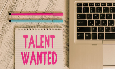 Wall Mural - Writing note showing Talent Wanted. Business concept for looking for a skill that someone has to do something very well Metallic laptop blank ruled notepad pens lying old wooden vintage table