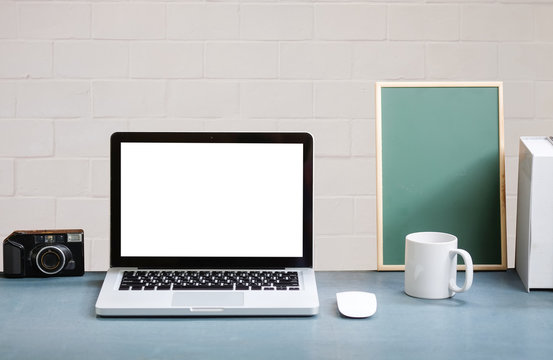 Workspace desk and laptop. copy space and blank screen. Business image, Blank screen laptop and supplies.