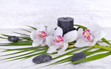Fototapeta Sypialnia - arrangement  with beautiful white orchids, pebbles and candle