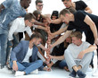 © ASDF - casual group of young people are quickly running towards their goal.