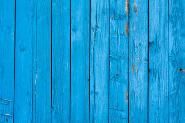 Bringt blue old painted vertical wooden planks. Abstract vintage wood background texture or banner.