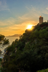 Wall Mural - Tower in Lloret de Mar at sunset, Costa Brava