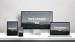 Web design studio promotion page on different display devices. Portfolio web design page concept