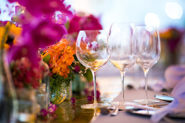 Table setting for a wedding or dinner event, with flowers