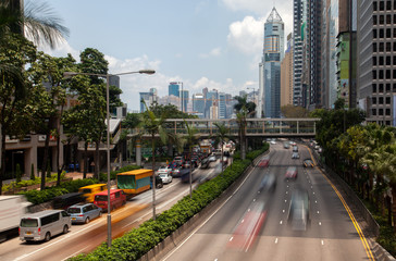 Hong Kong street highway with heavy traffic on day