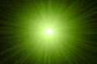 © Ornavi - Green abstract background with rays of light. Futuristic computer graphic.