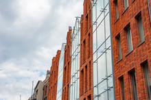 Modern Brick And Glass Facade Of The Building