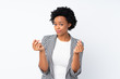 © luismolinero - African american woman with blazer over isolated white background making money gesture