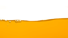 Orange Water Surface With Bubble And Water Splash On White Background