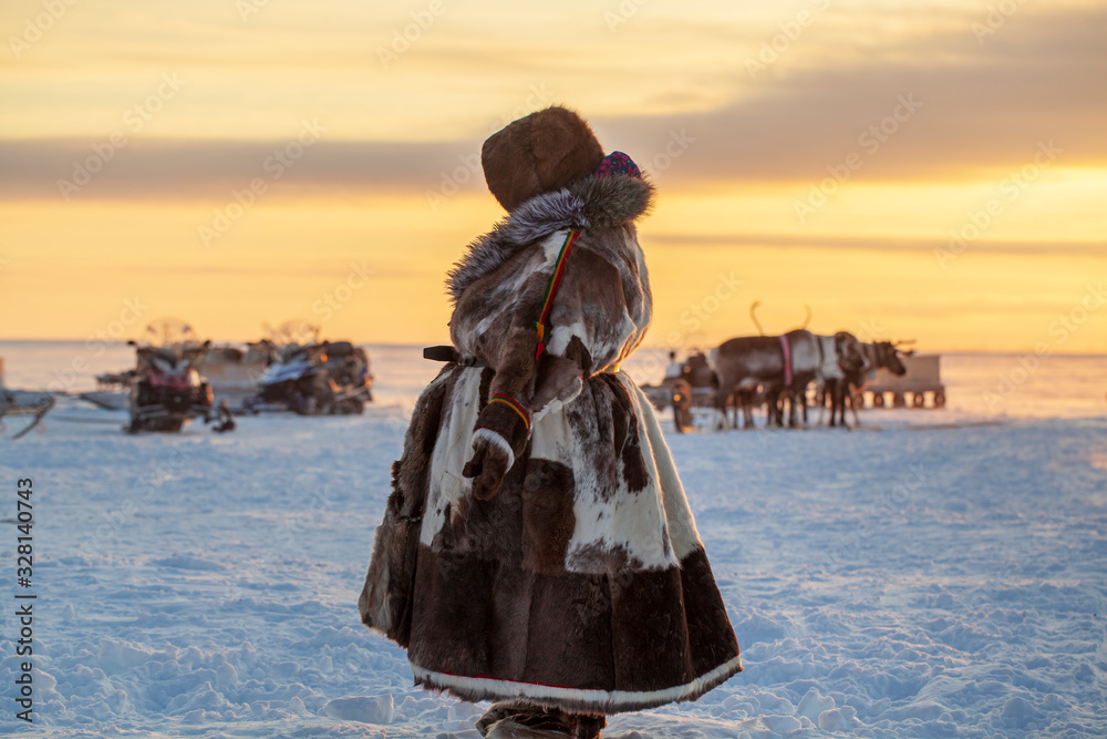  Far North, Yamal Peninsula, Reindeer Herder's Day, local residents in national clothes of Nenets - obrazy, fototapety, plakaty 
