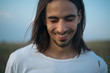 © FrameWorks/Stocksy - Smiling man portrait