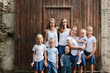 © LÈa Jones/Stocksy - eight siblings