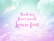 © AmySachar - Think big Start small Learn fast handwriting word on blue and pink pastel sky background