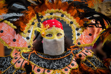 Closeup Portrait Of Young Girl In Motley Masquerade Costume At Dominican Carnival