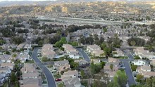 Aerial Drone Rising Of Santa Clarita Residential Neighborhood During Sunset, California