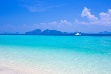 beautiful summer beach with clear water and blue sky in south of thailand
