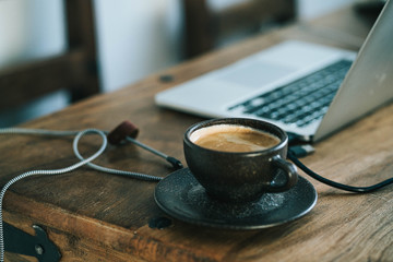 cup of coffee and laptop