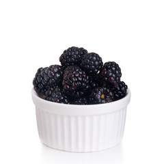 Wall Mural - blackberry or fresh blackberry on a background new.