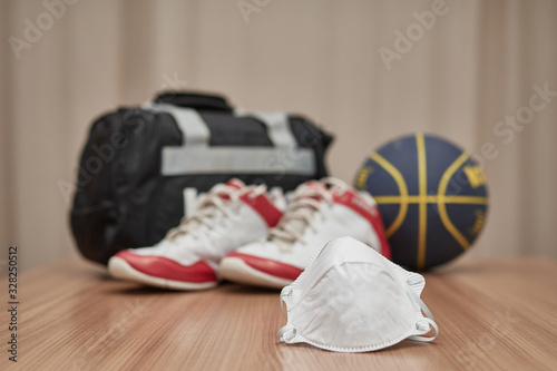 coronavirus protective mask, back, ball shoes and basketball bag