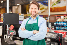 Man As A Satisfied Seller Or Cashier
