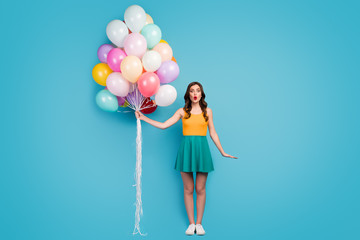 Sticker - Full length photo of astonished girl celebrate her birthday with friends recieve dream present hold many air baloon stare stupor wear gumshoes tank-top isolated blue color background