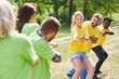 © Robert Kneschke - Young people in tug of war competition