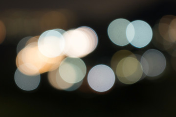 Beautiful bokeh light on a black background. Defocused.