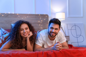 Sticker - Happy young couple in bedroom