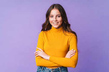 image of young beautiful woman with long brown hair smiling at camera