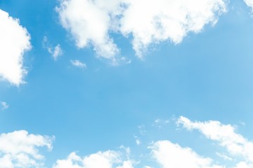 Wall Mural - Blue sky background. Blue sky with fluffy white clouds. Copy space