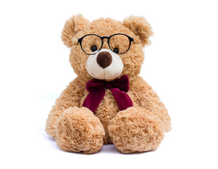 brown teddy bear with eye glasses isolated on white background.