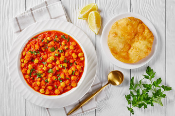 Chana masala or chickpea curry on a white plate