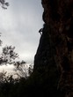 © luciezr - silhouette of a climber on an overhanging rock