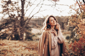 Beautiful girl in autumn park 