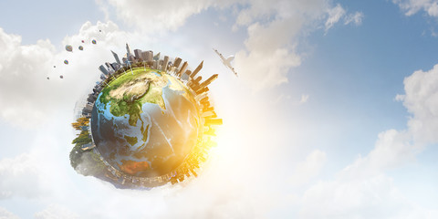 planet earth model with city skyline