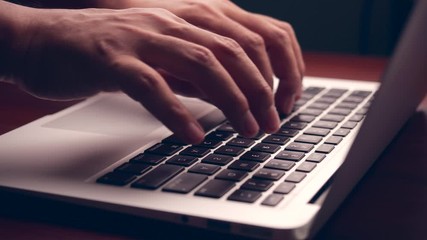 Aufkleber - Businessman hands working and typing on laptop keyboard in 4K slow motion