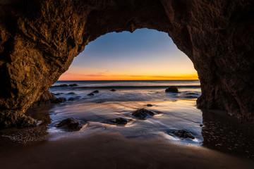 Wall Mural - sunset from the sea cave 