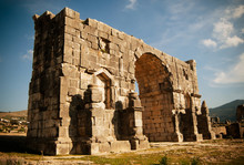 Ancient Roman Ruins At An Archaeological Site, Volubilis, Morocco