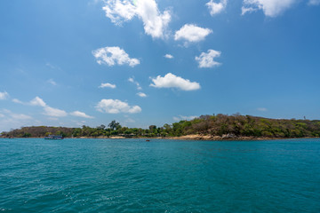 beautiful soft wave clear blue transparency sea ocean water and rocks at the bottom of the tropical paradise beach coast summer sea view at Samed Island, Rayong, Koh Samet, Thailand.