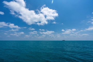 beautiful soft wave clear blue transparency sea ocean water and rocks at the bottom of the tropical paradise beach coast summer sea view at PP Island, Krabi, Phuket, Thailand.