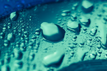 Aufkleber - Close up beautiful colored water drops on a cd disk background.