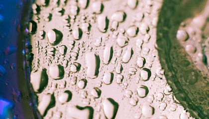 Aufkleber - Close up beautiful colored water drops on a cd disk background.