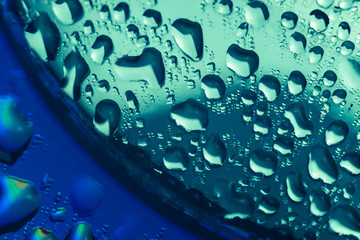 Aufkleber - Close up beautiful colored water drops on a cd disk background.