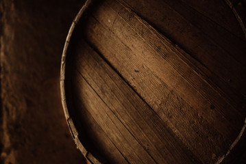 Wall Mural - Beer barrel close-up. Oak barrel texture