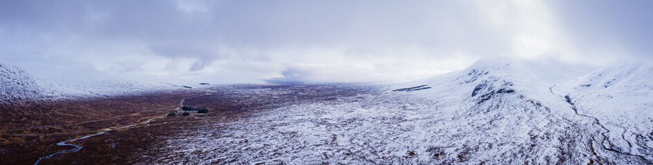 aerial drone shot of glen etive in the argyll region of the highlands of scotland showing loch etive and the entrance to glencoe